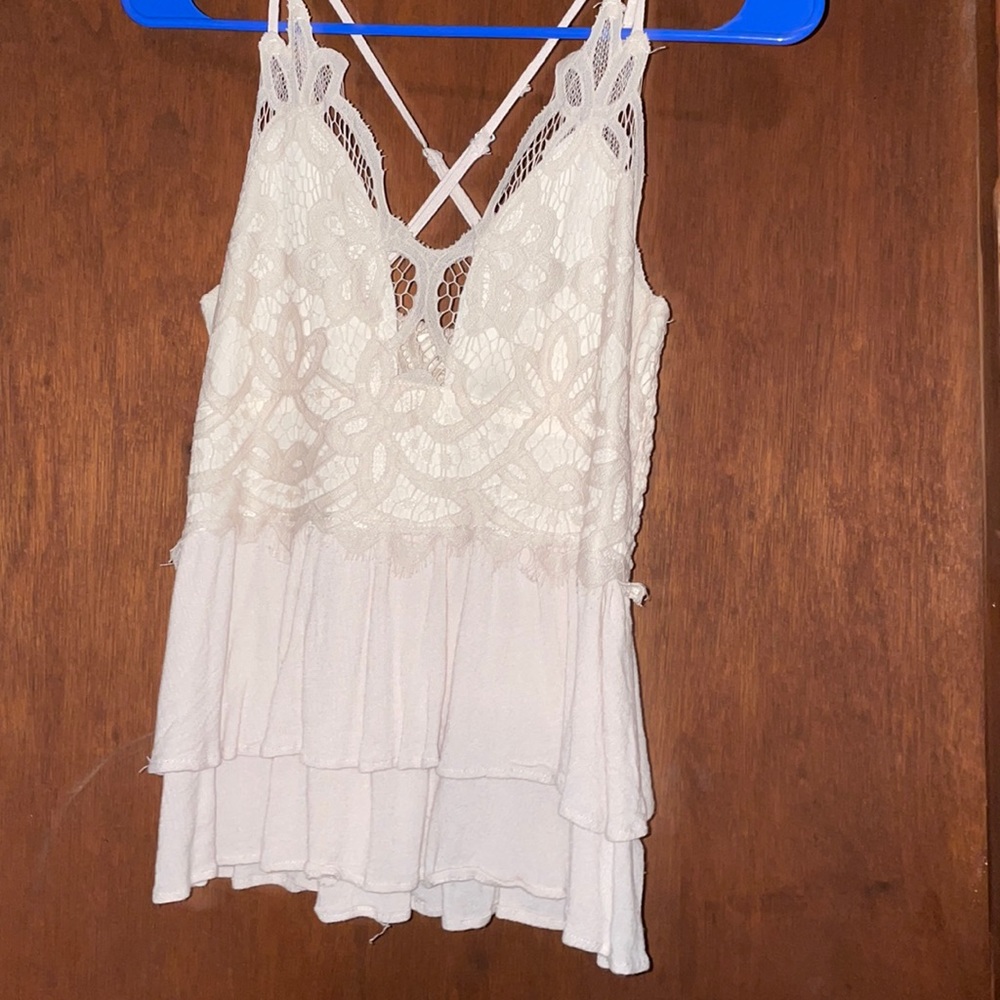 Small Entro top from Buckle. Pink/cream color